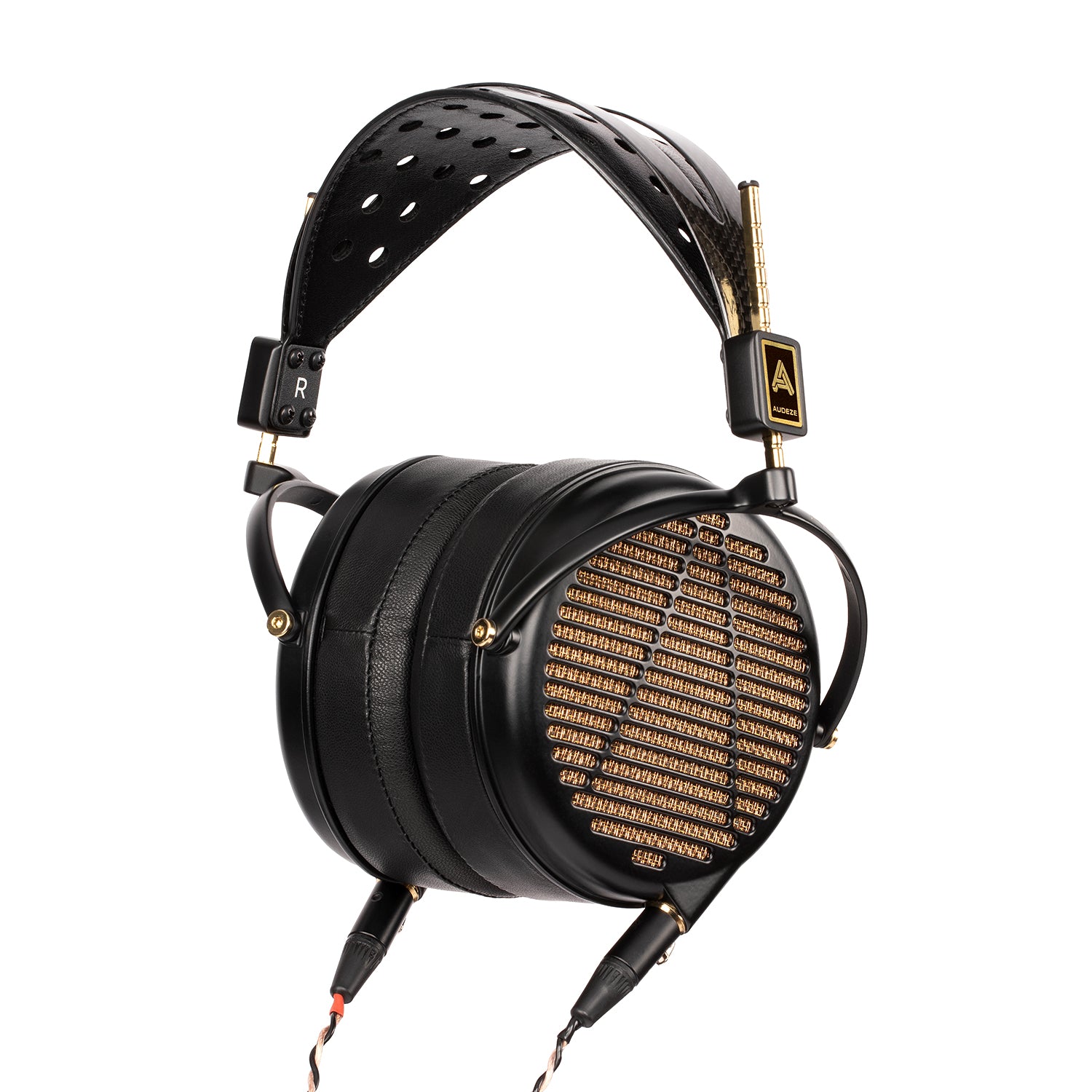 Black leather headphones with brass accents and a mesh grille design, perfect for audiophiles and stylish listening.