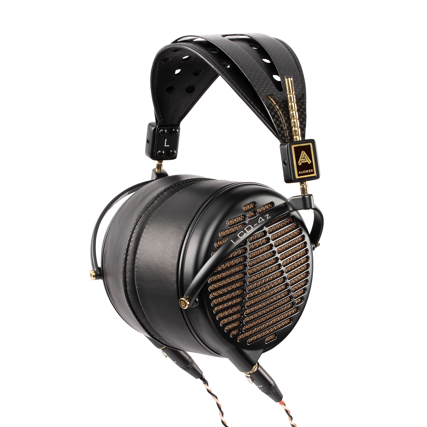 Black leather over-ear headphones with gold accents and perforated metal grill for premium sound and style.