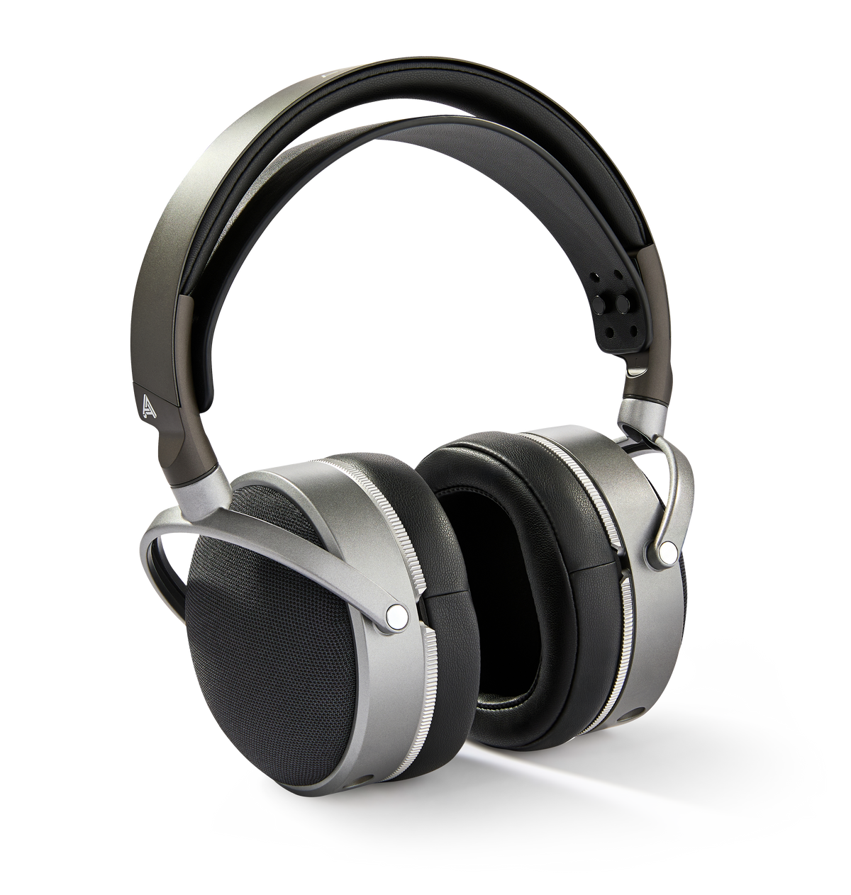 Premium silver and black over-ear headphones with a sleek design and cushioned ear pads for comfort.