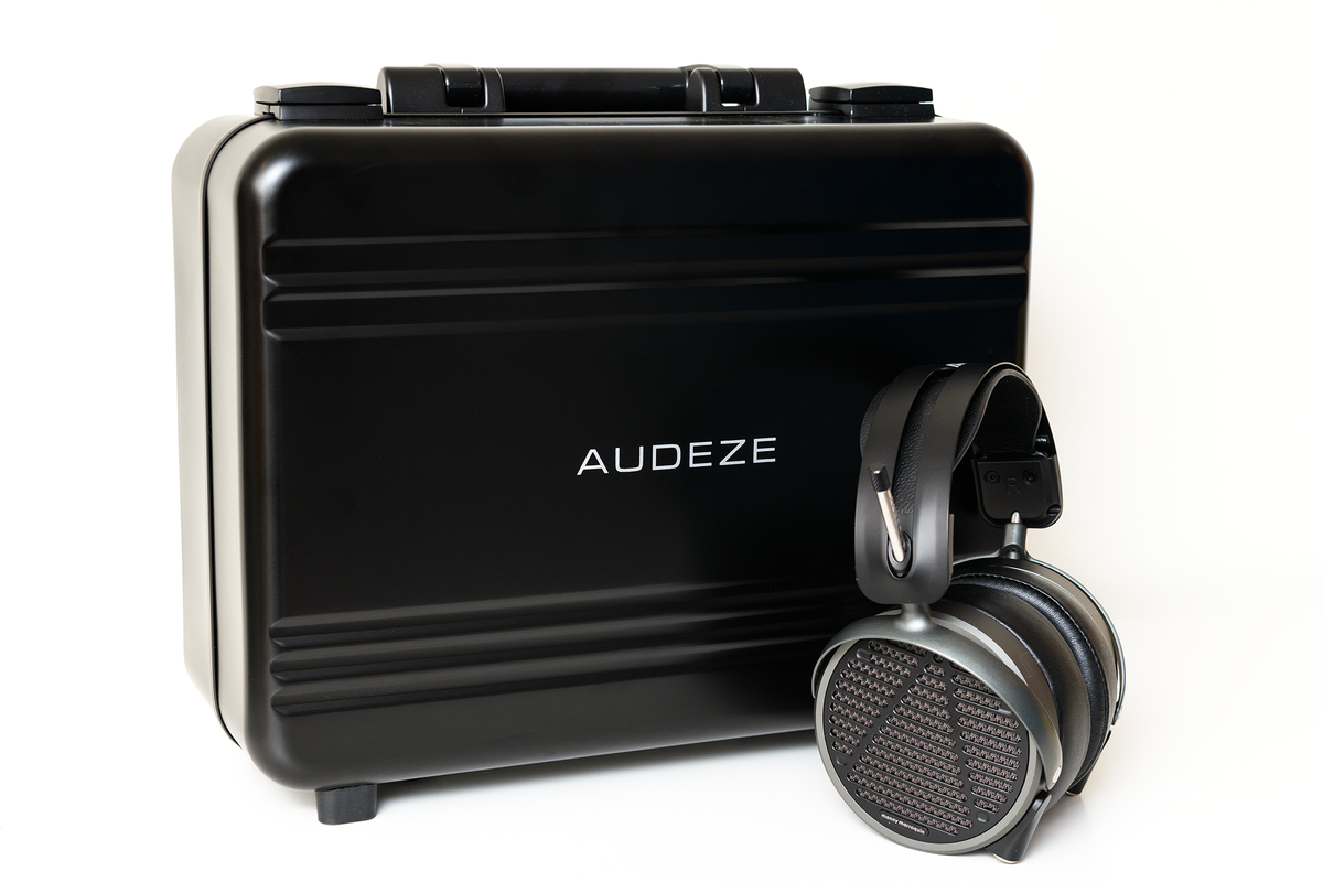 Audeze black hard case with sleek gray headphones, featuring a modern style and durable materials.