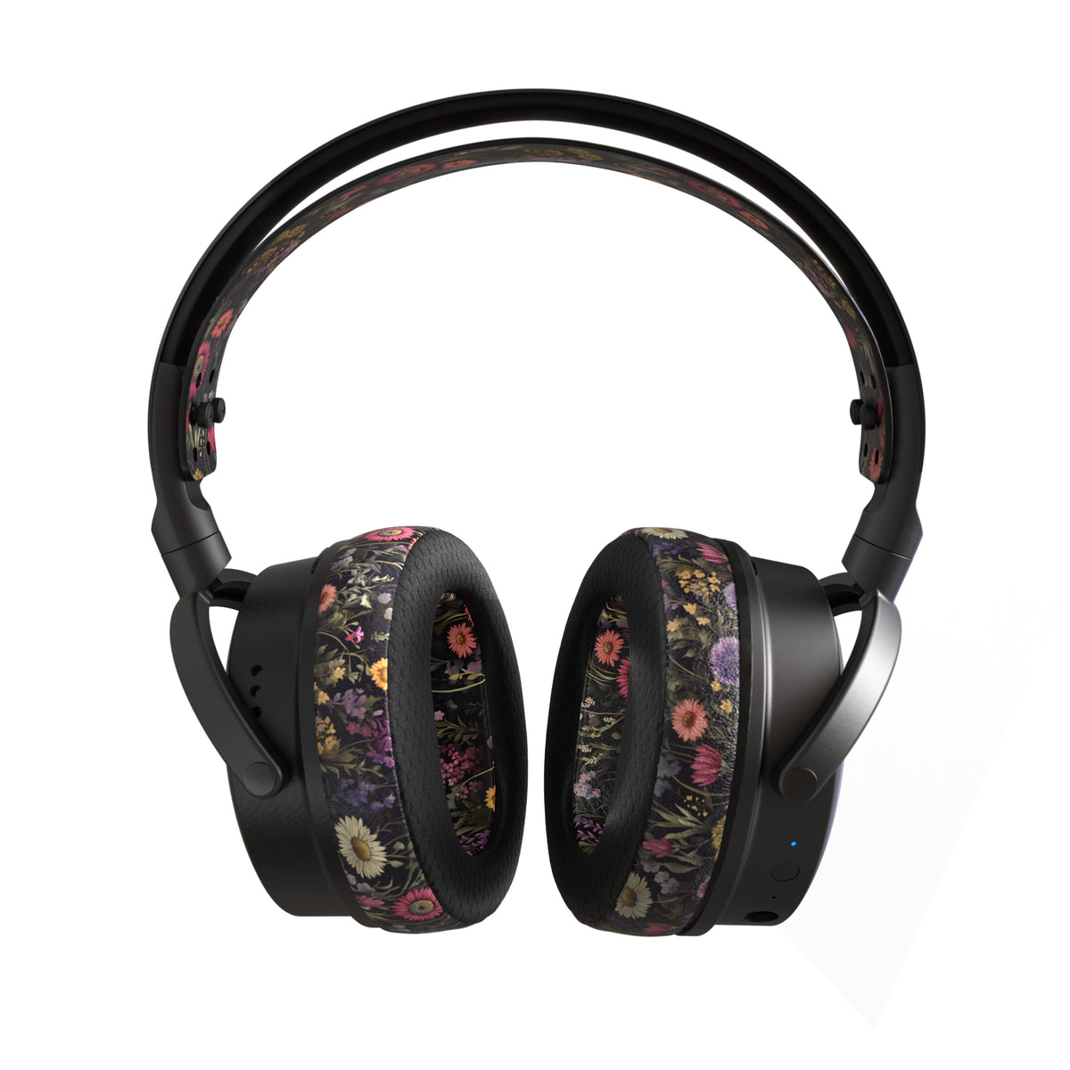 Black wireless headphones with floral-patterned ear cushions and a sleek design, perfect for stylish music lovers.