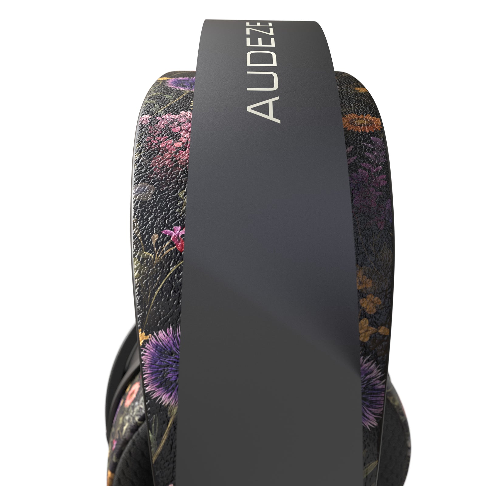 Audeze floral headphones with a black frame and vivid purple and green accents. Stylish and comfortable design.