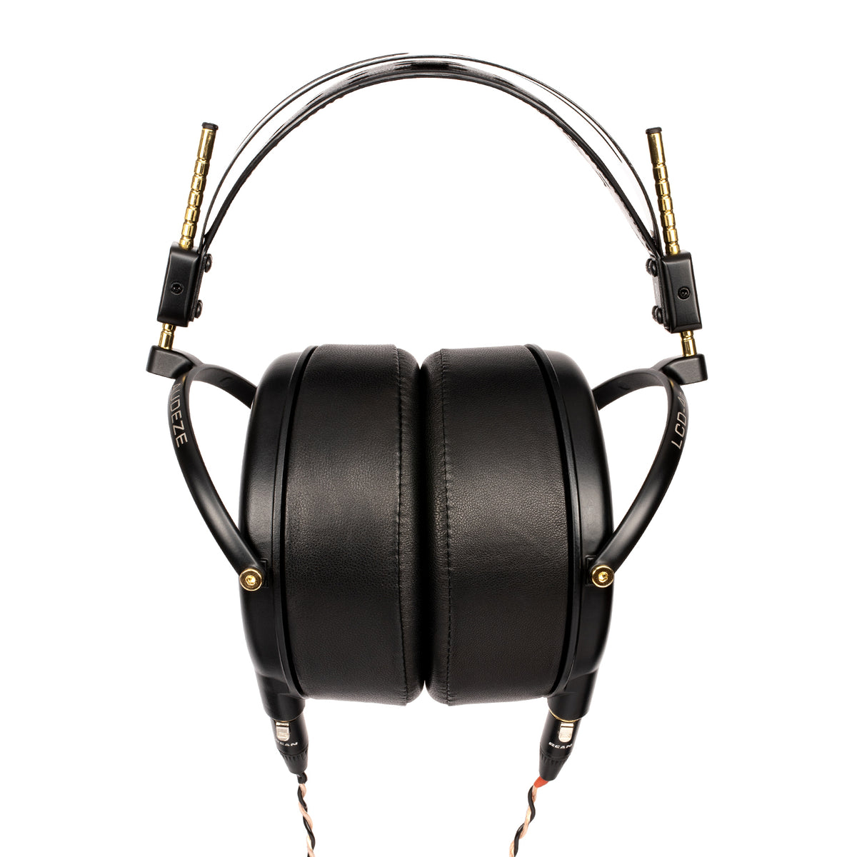 Black over-ear headphones with gold accents and padded leather ear cups for enhanced comfort and sound quality.