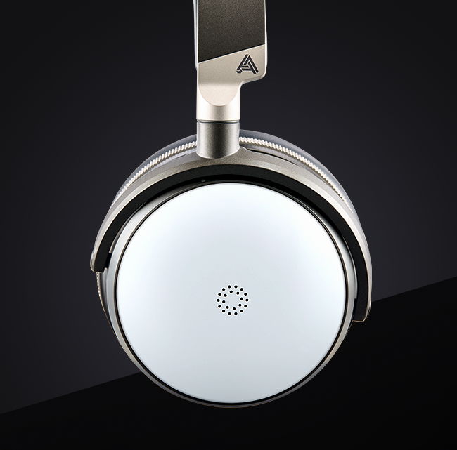 Silver over-ear headphones with a sleek white ear cup and modern minimalistic design.