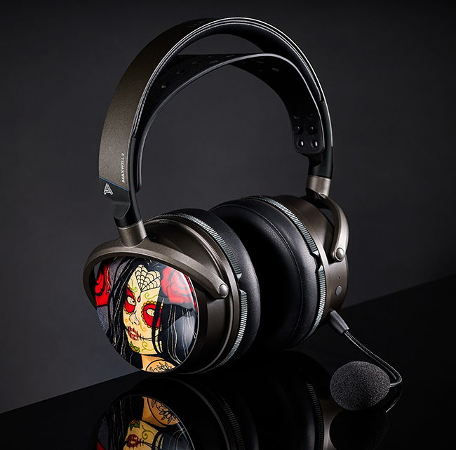 Stylish black and bronze gaming headset with intricate sugar skull design and detachable microphone.