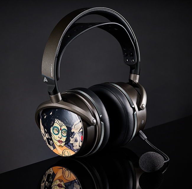 Stylish black and bronze gaming headset with colorful skull and Día de los Muertos art on earcups and detachable mic.